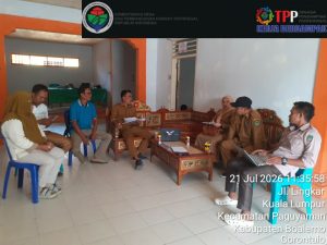 Pemerintah Desa Kualalumpur Terima Kunjungan Tim Monitoring dan Evaluasi Kecamatan Paguyaman